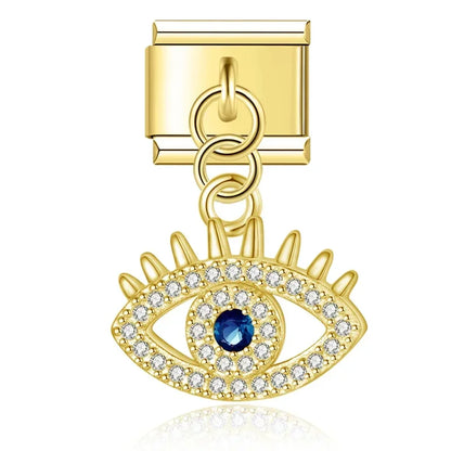 Œil pendentif strass